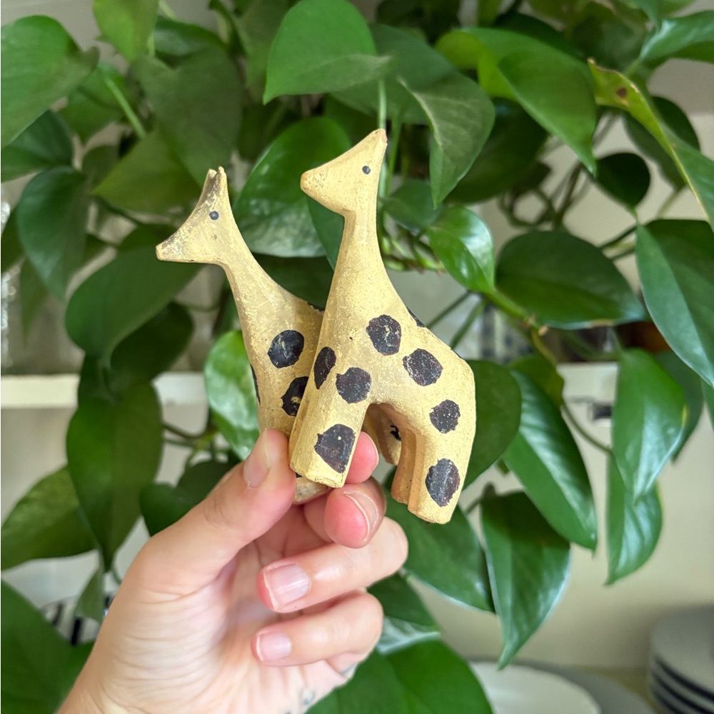 Small hand carved giraffes